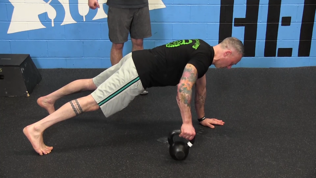 Plank with kettlebell hotsell